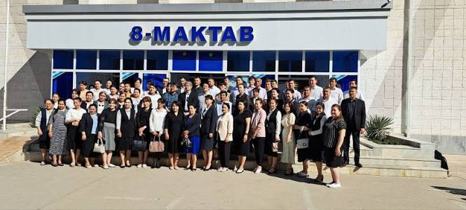 Staff members gathered outside Secondary School No. 8